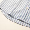 Hem_detail_of_striped_shirt_20260922213254 STRIPE SHIRT SKY BLUE