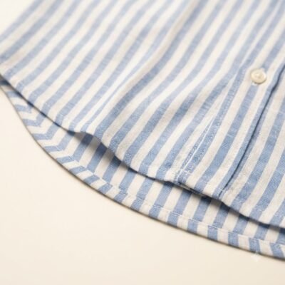 Hem_detail_of_striped_shirt_20260922213254 STRIPE SHIRT SKY BLUE